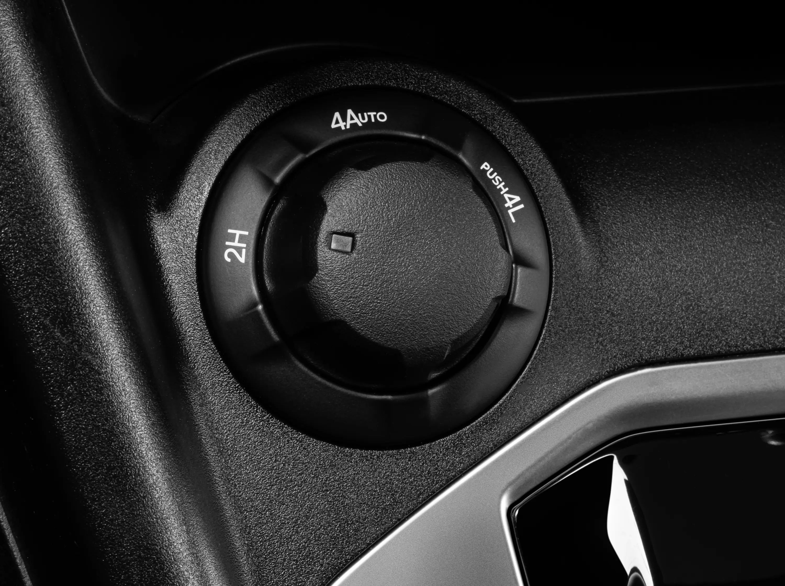 Interior de Fiat Titano com destaque para seletor de tração 4x4.